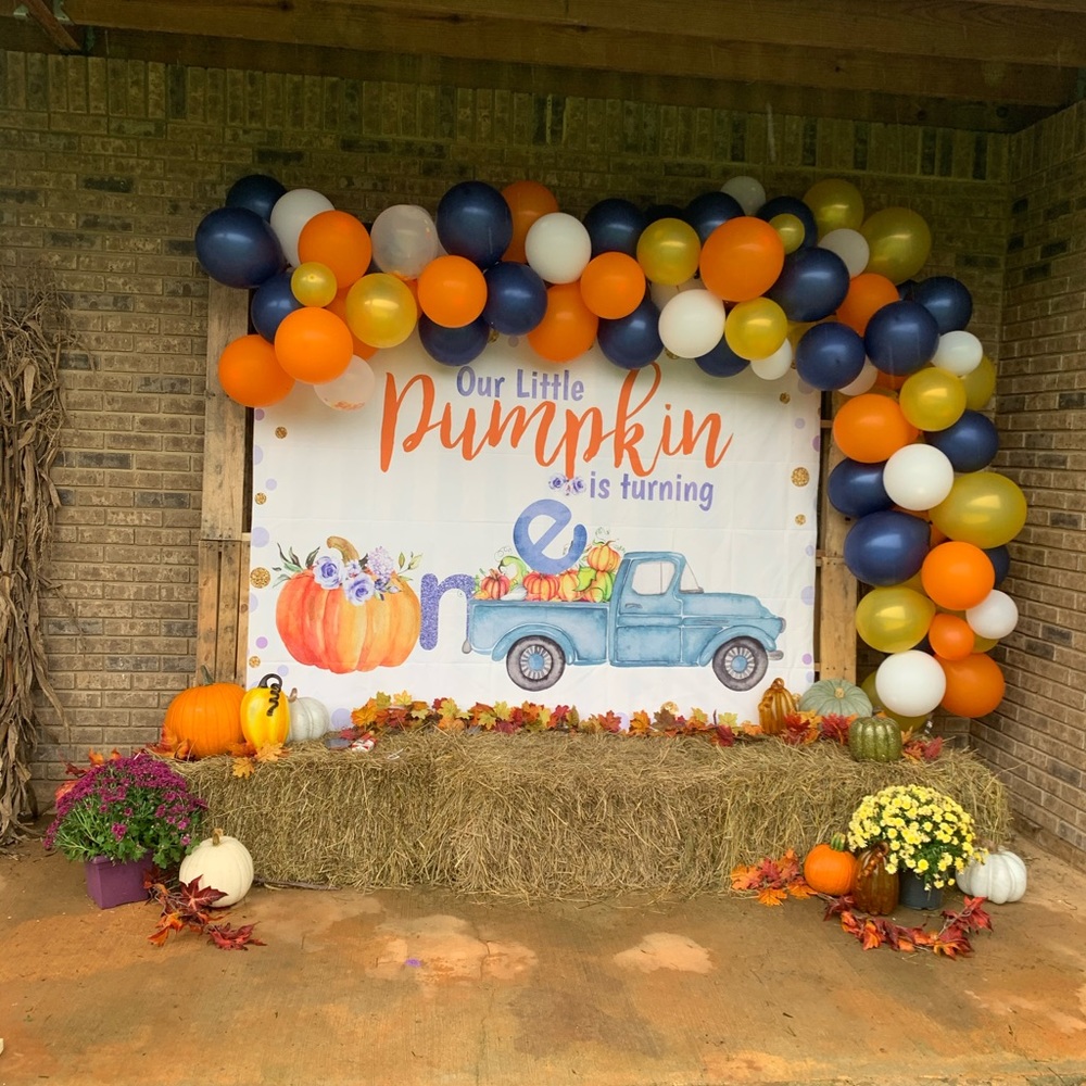 Blue truck and pumpkin party decor